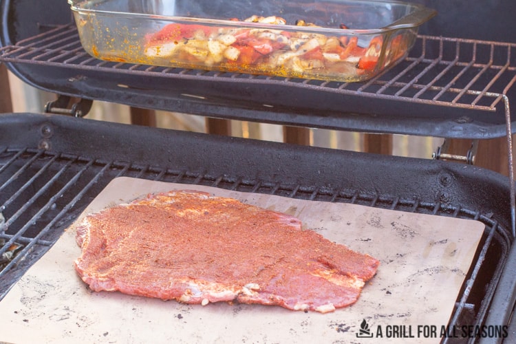 steak on grilling mat for lettuce wrap fajitas