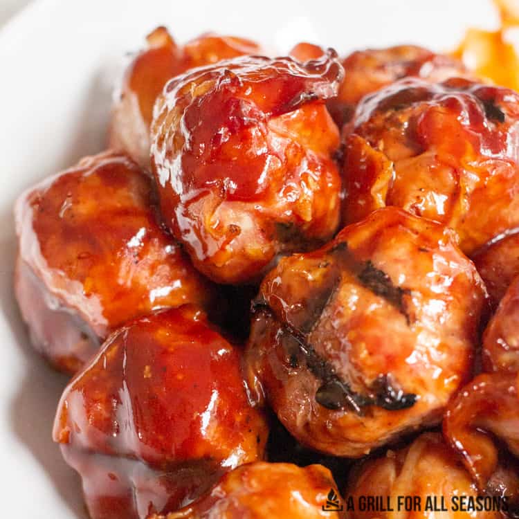 cooked meatballs glazed with bbq sauce