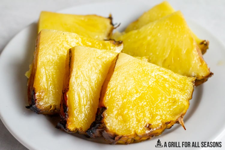slices of smoked pineapple on plate