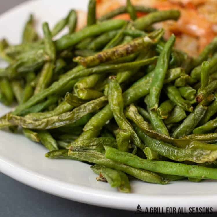 close up of air fryer frozen green beans