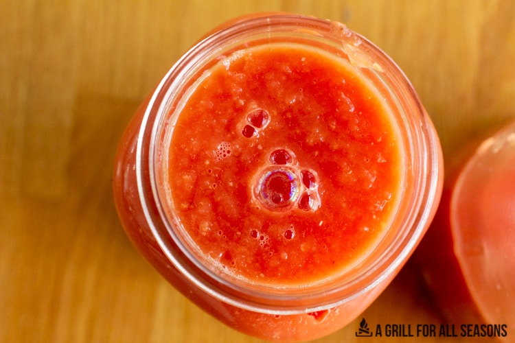 top view of smoked tomato sauce in a mason jar