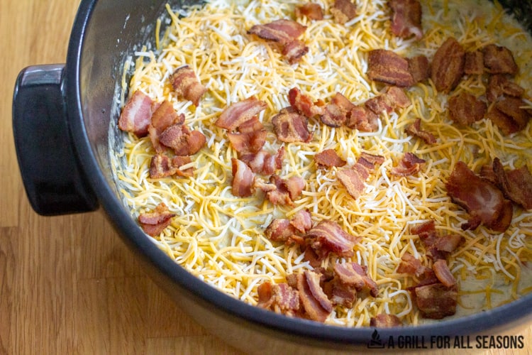 bacon and cheese with other ingredients in pot