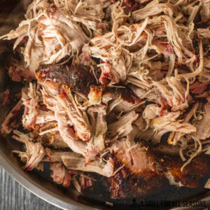 close up of traeger pulled pork in a large bowl