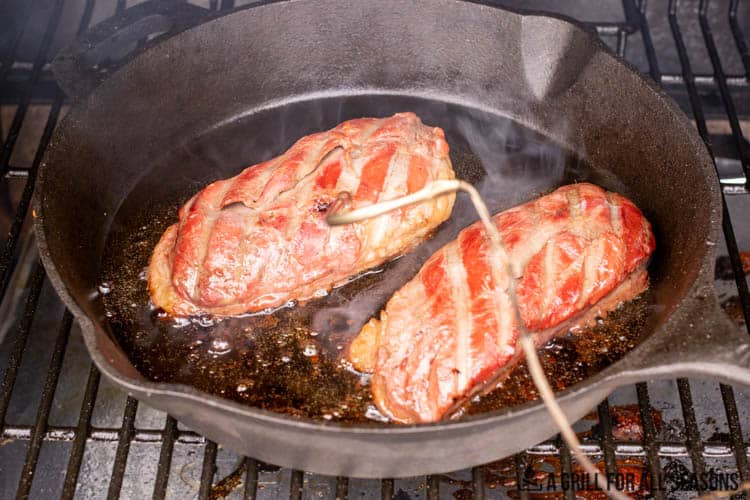 Reverse searing duck breasts in cast iron pan.
