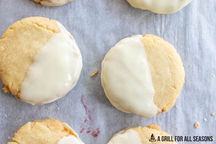 white chocolate raspberry cookies on parchment paper