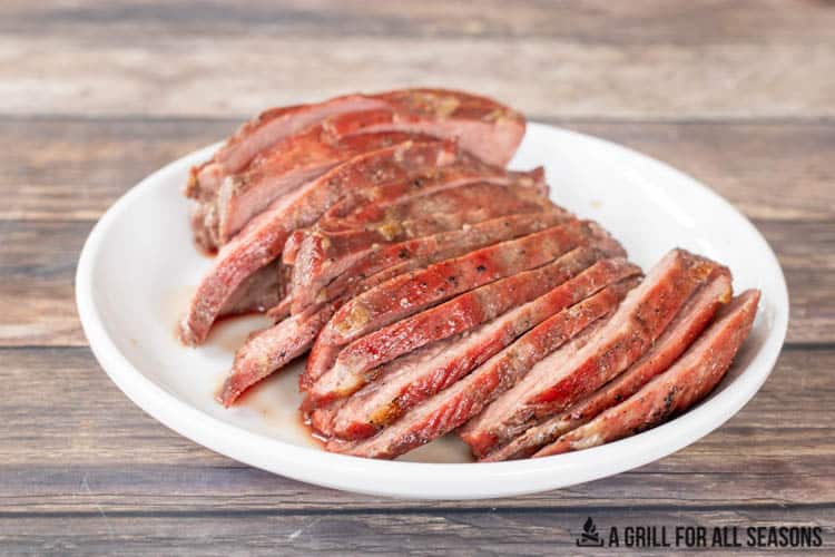 plate with slices of smoked traeger tri tip