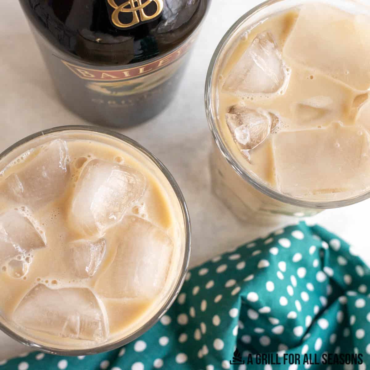 close up overhead shot of two glasses of baileys iced coffee