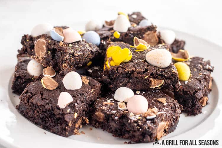 plate with a pile of mini egg brownies