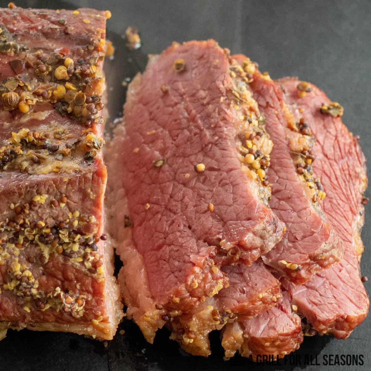 close up of traeger corned beef sliced on cutting board