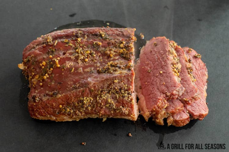 traeger corned beef sliced on cutting board