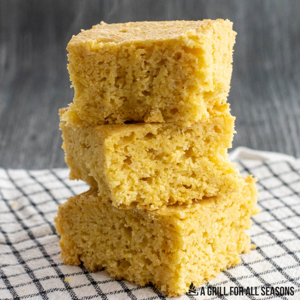 stack of three pieces of smoked cornbread