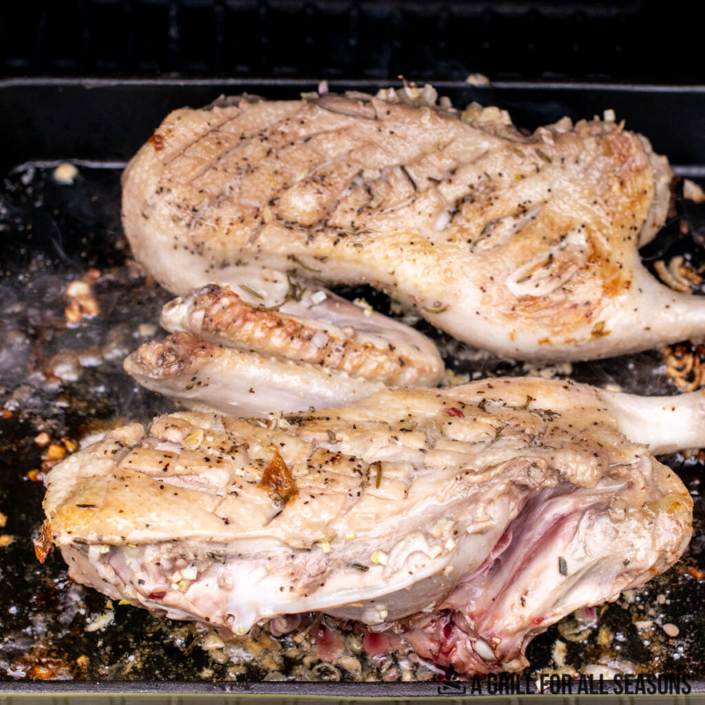 close up of traeger duck on the smoker