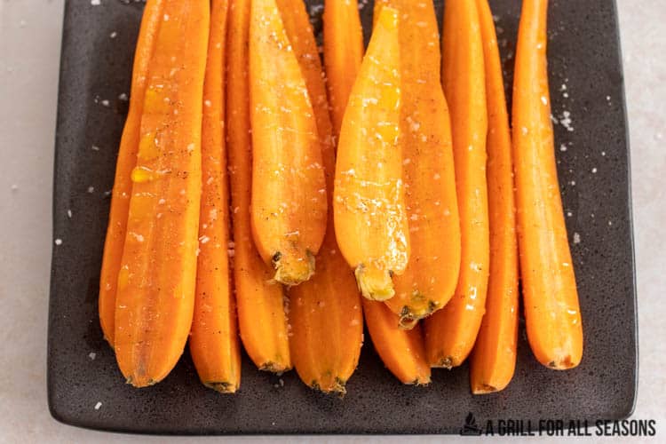 halved carrots on plate