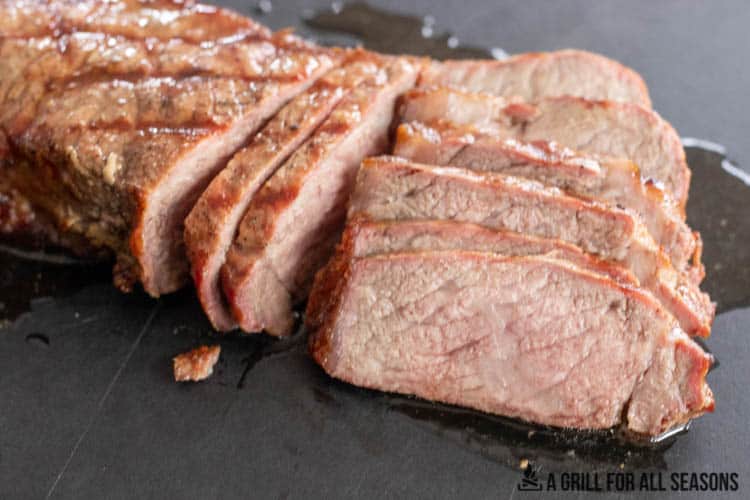 slices of traeger steak on cutting board