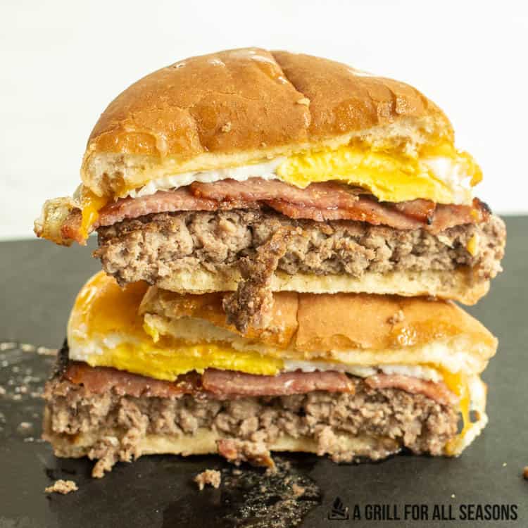 halved taylor ham, egg, and cheese burger stacked