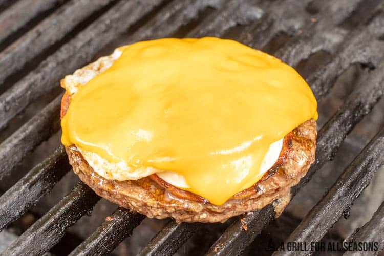 burger topped with egg, taylor ham, and cheese