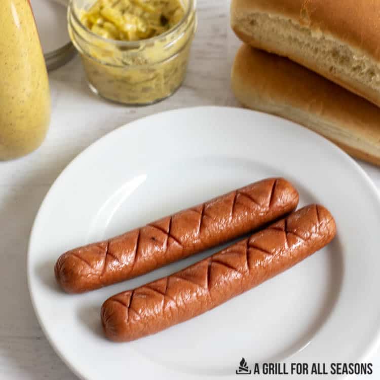 smoked hot dogs on plate