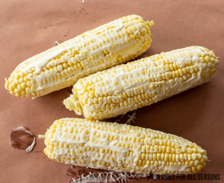 three ears of corn on paper