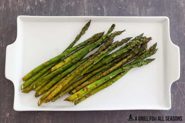 white platter with asparagus