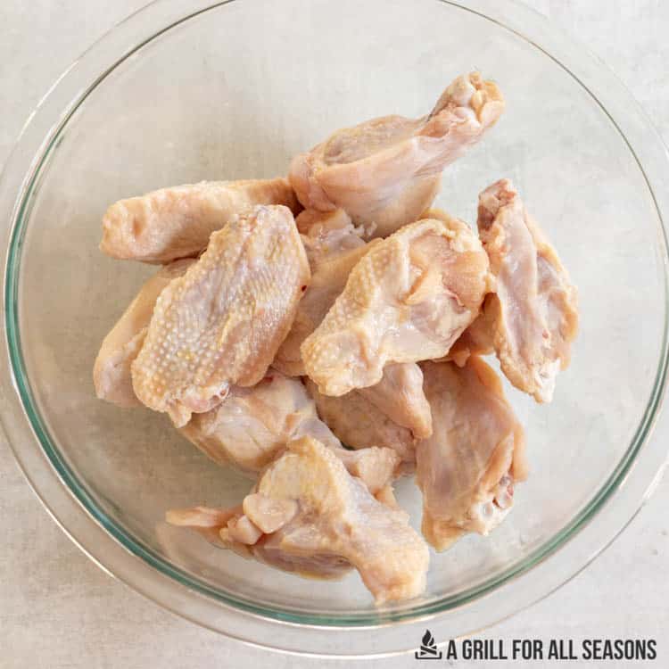 bowl of raw chicken wings