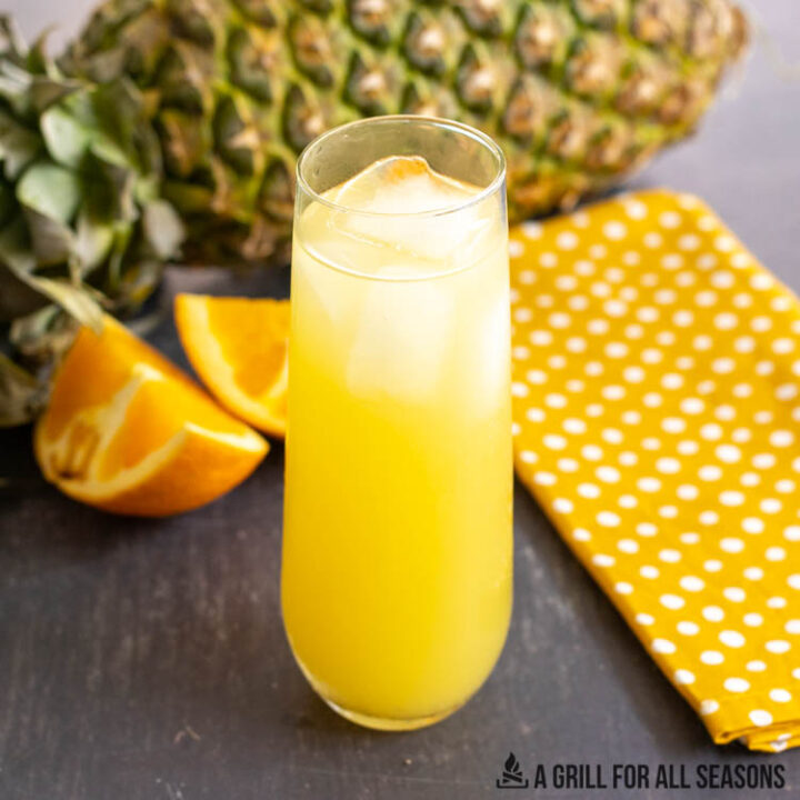 pineapple screwdriver in stemless flute