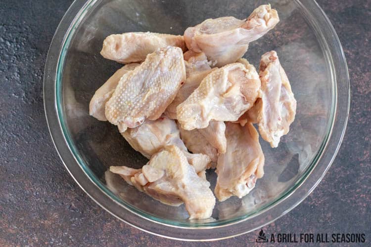 bowl of raw chicken wings