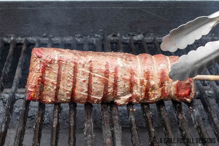 smoked beef tenderloin being reverse seared