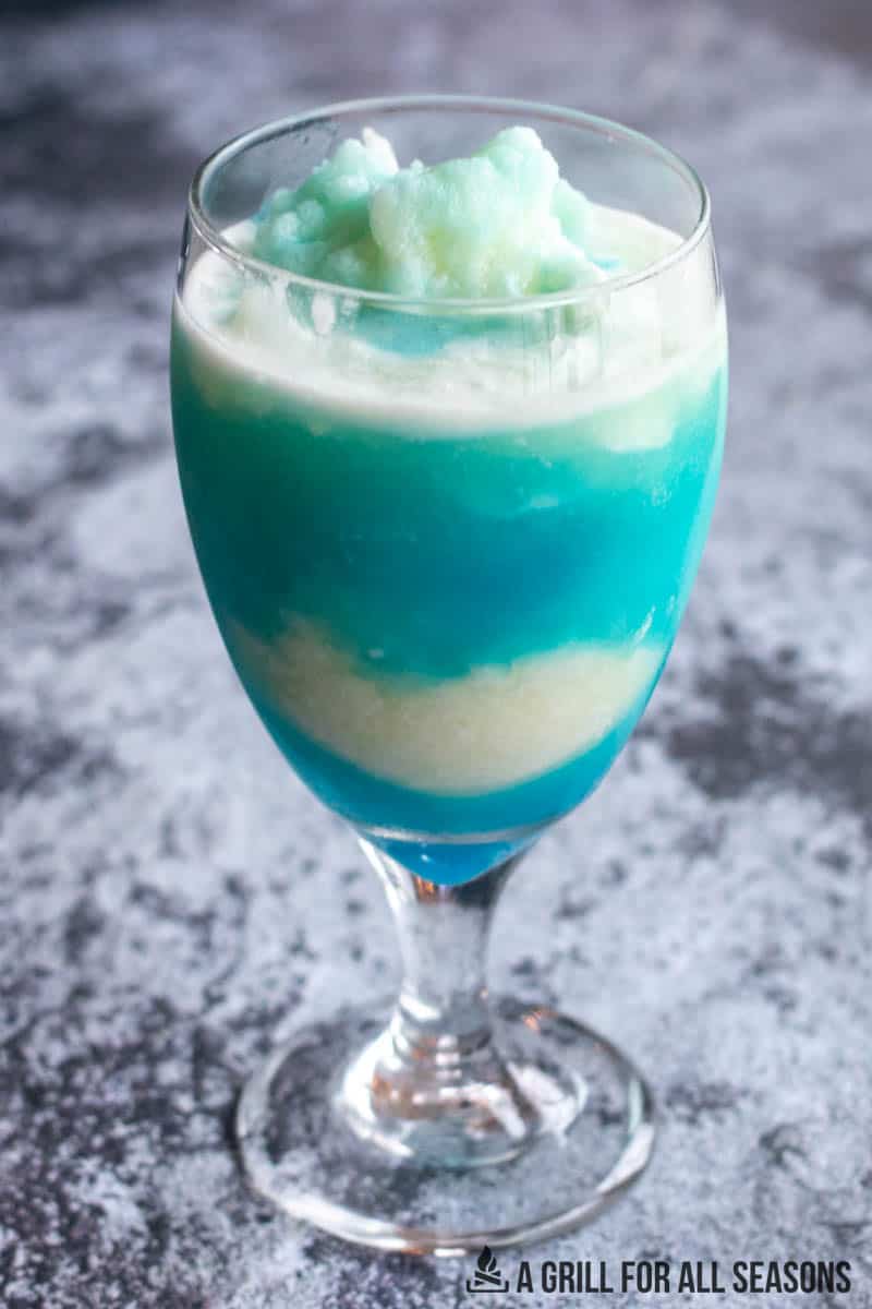 blue colada drink in glass