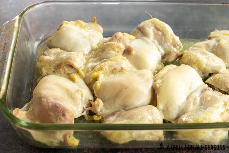 cooked chicken thighs in a casserole pan