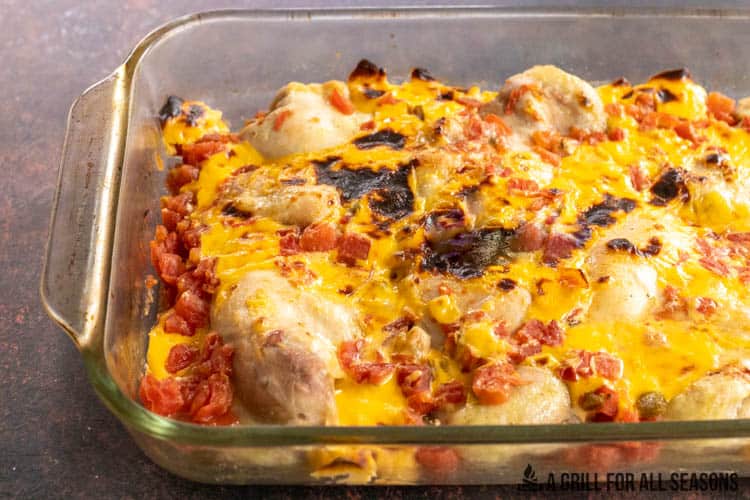 casserole dish of roasted queso chicken