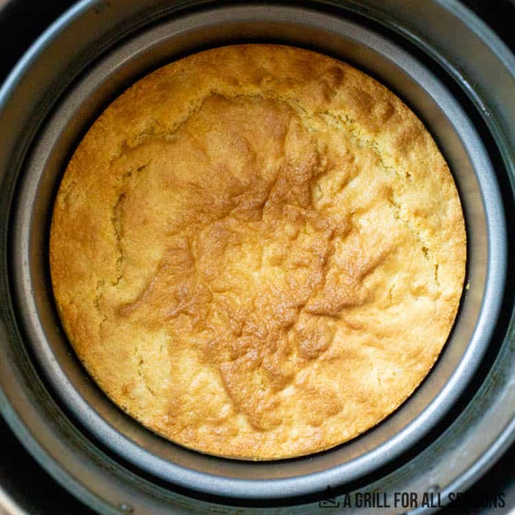 air fryer with baked bread inside