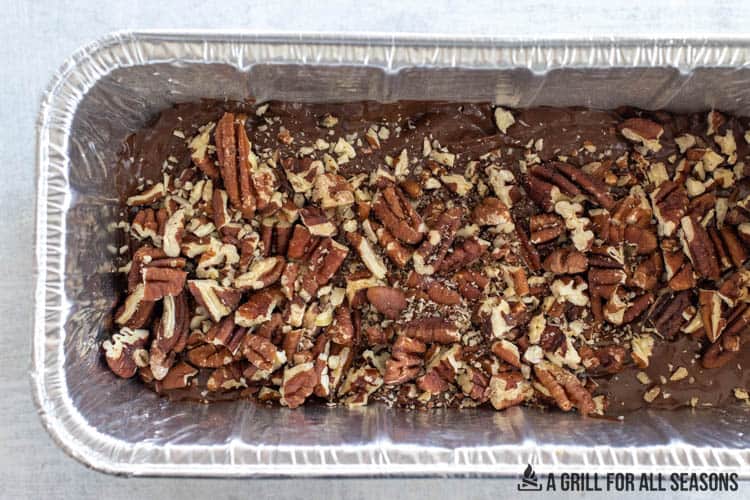 chopped pecans on top of chocolate
