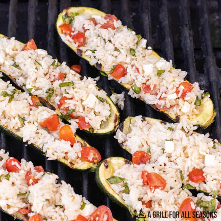 stuffed zucchini cooking on the grill