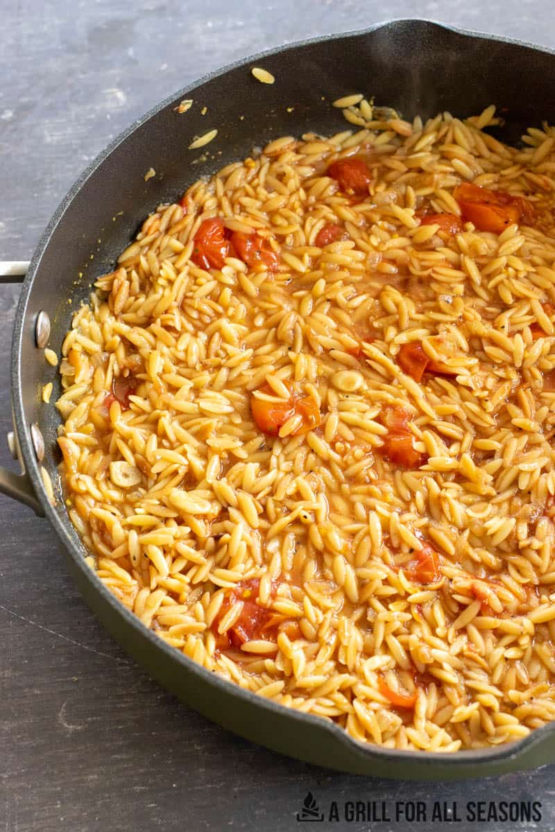 tomato orzo cooking in pan