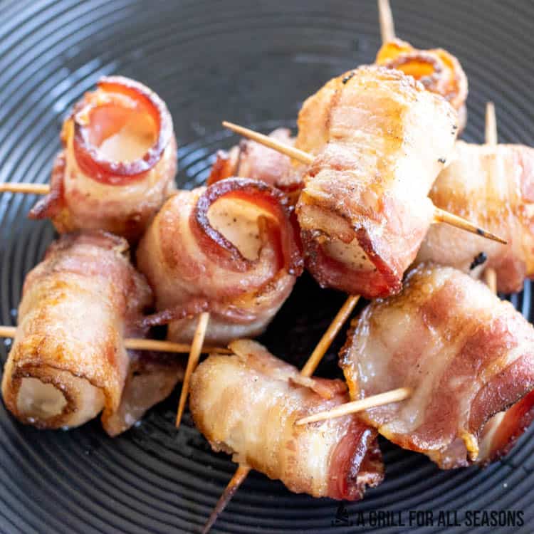 grilled bacon wrapped cod appetizers plated