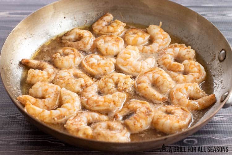 shrimp cooking in a pan