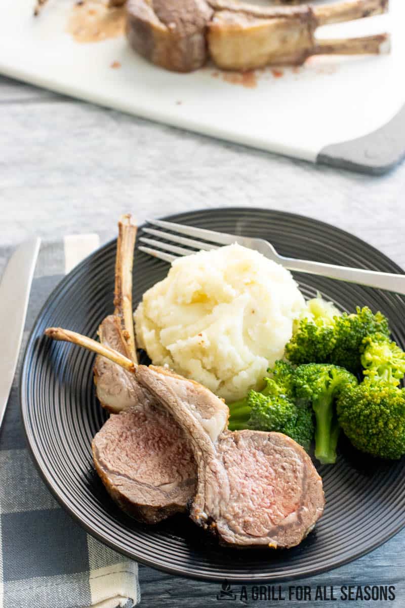 air fryer rack of lamb on dish to serve