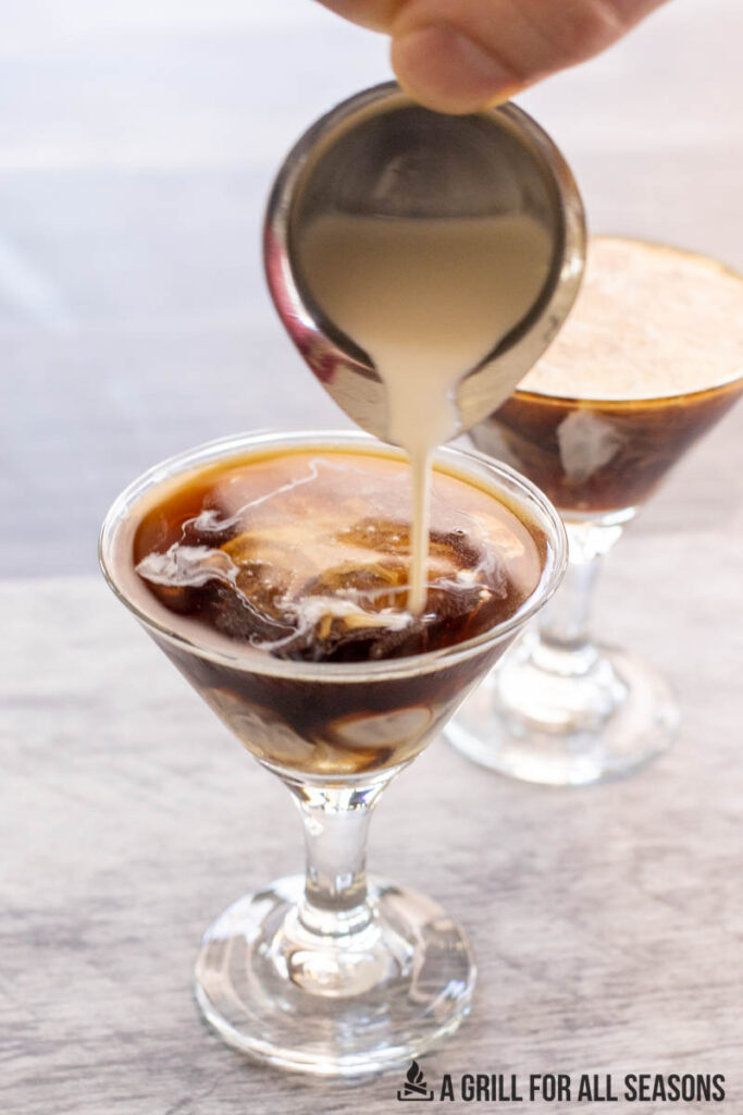 creamy espresso martini being combined in glass