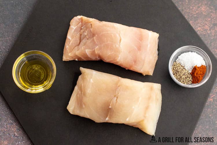 raw fish on cutting board