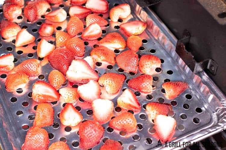 berries on tray in smoker