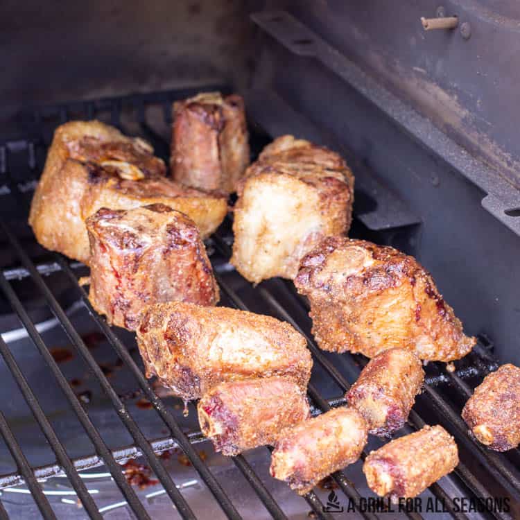 oxtail pieces on smoker
