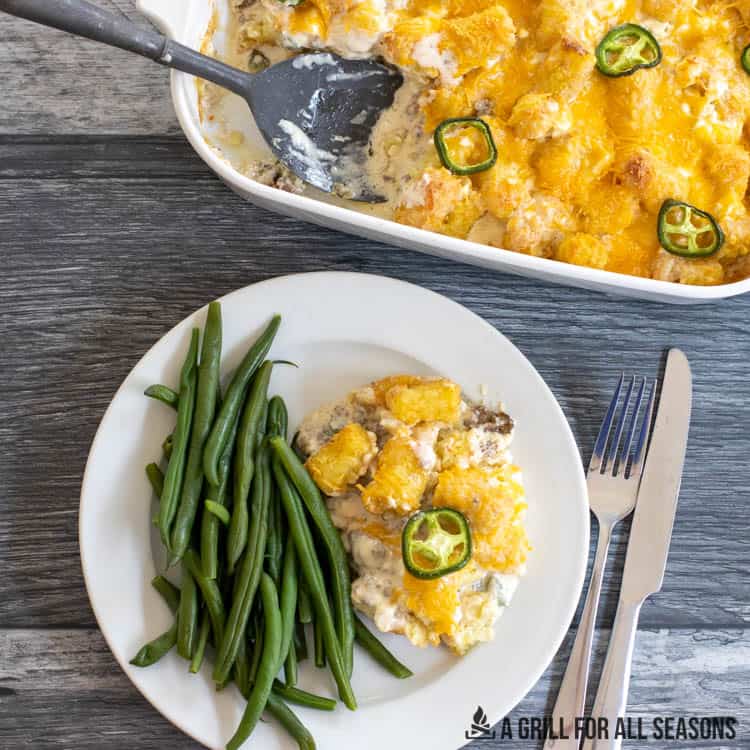 jalapeno tater tot casserole recipe plated with green beans