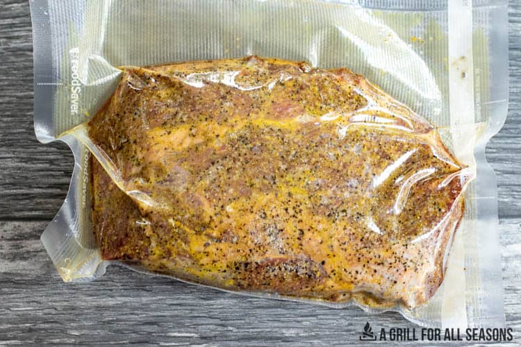 seasoned beef roast sealed in vacuum bag