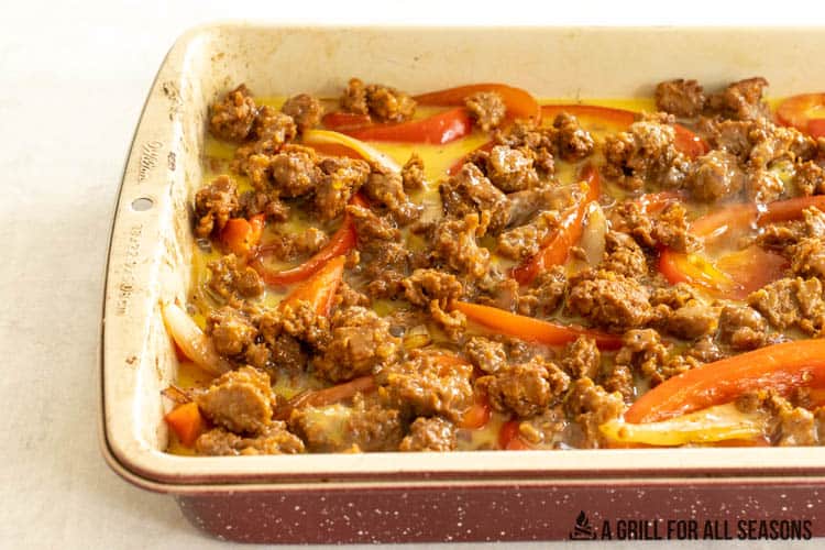 casserole dish with vegetables sausage and eggs