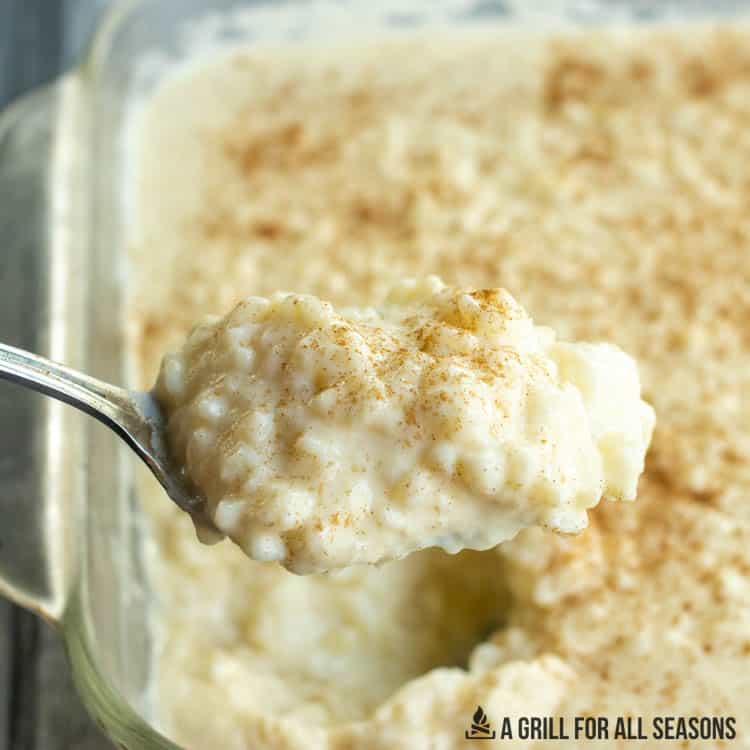 spoon lifting up some of the irish rice pudding recipe
