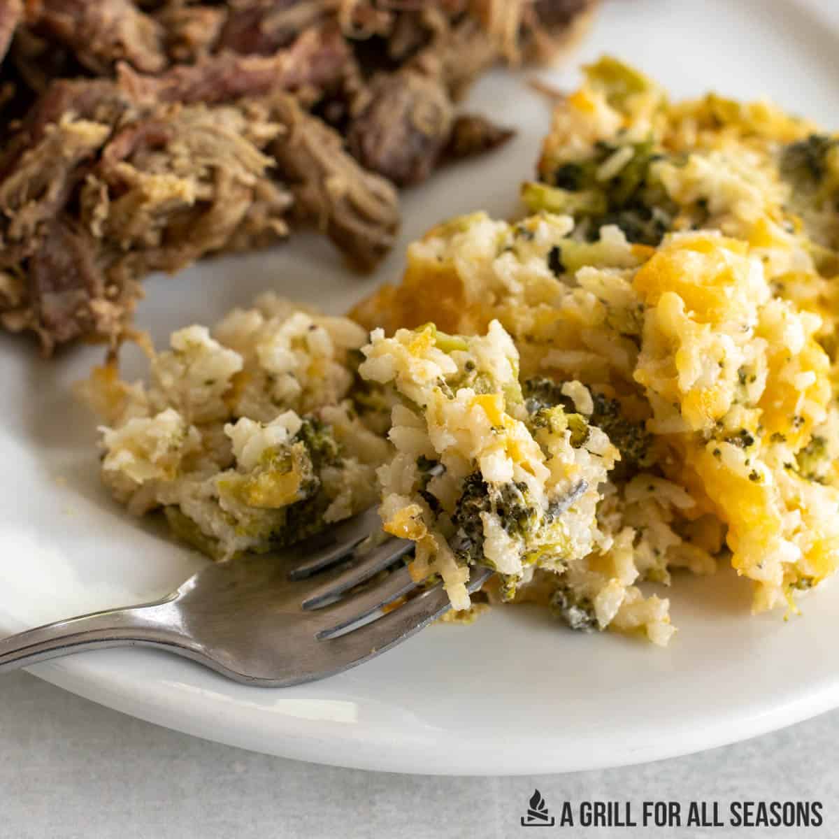 southern broccoli rice casserole recipe and pulled pork on dinner plate