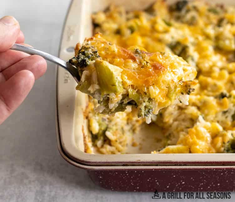 spoon lifting up some of the southern broccoli rice casserole recipe