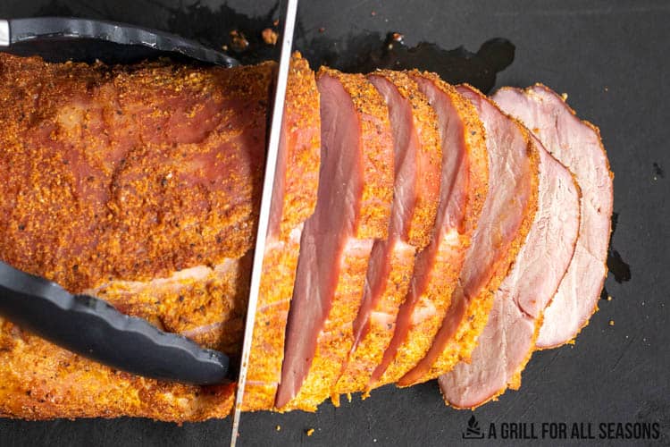 slicing smoked pork roast