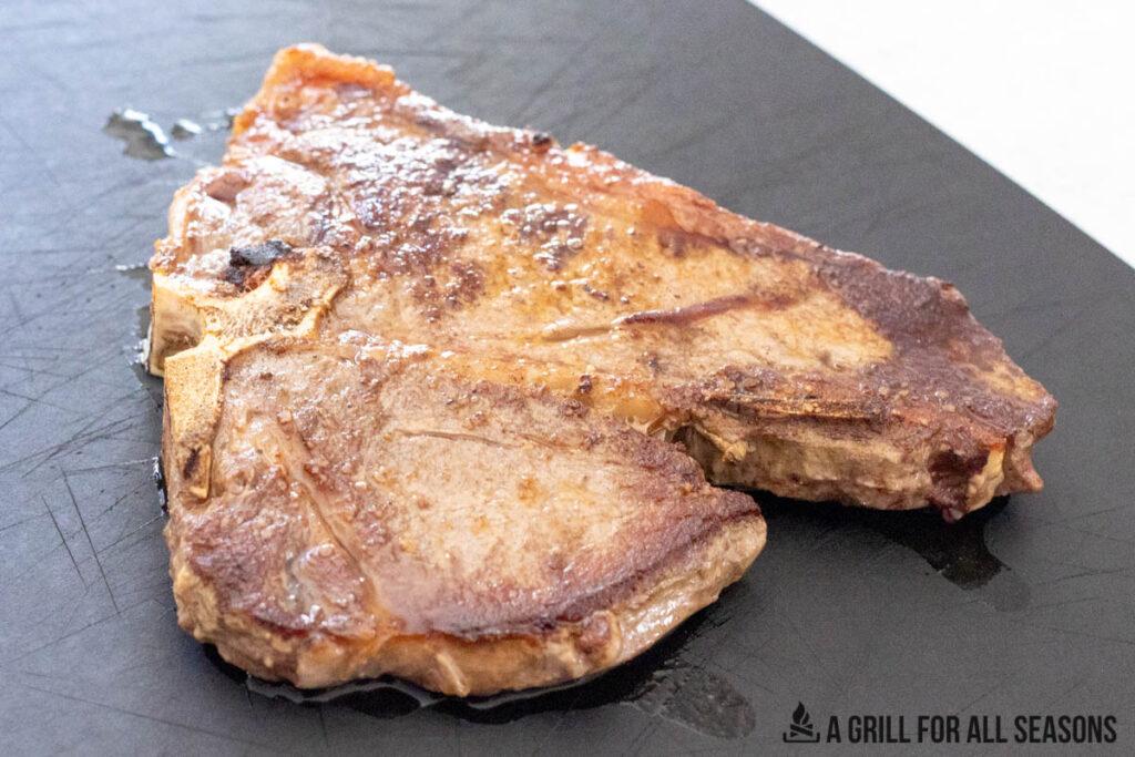 blackstone steak recipe resting on cutting board