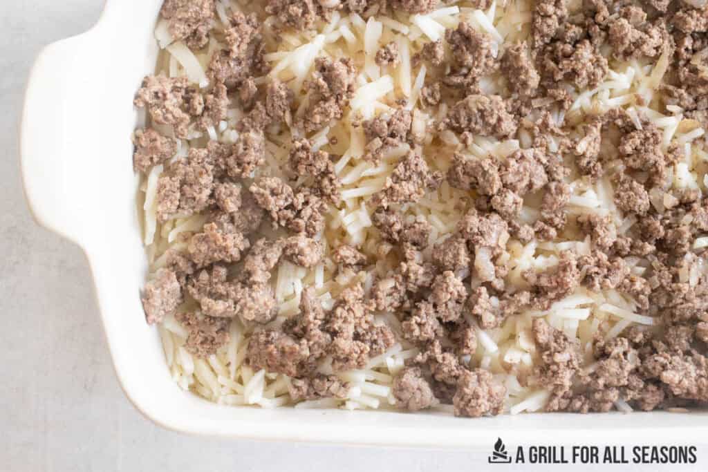 meat added on top of the potatoes